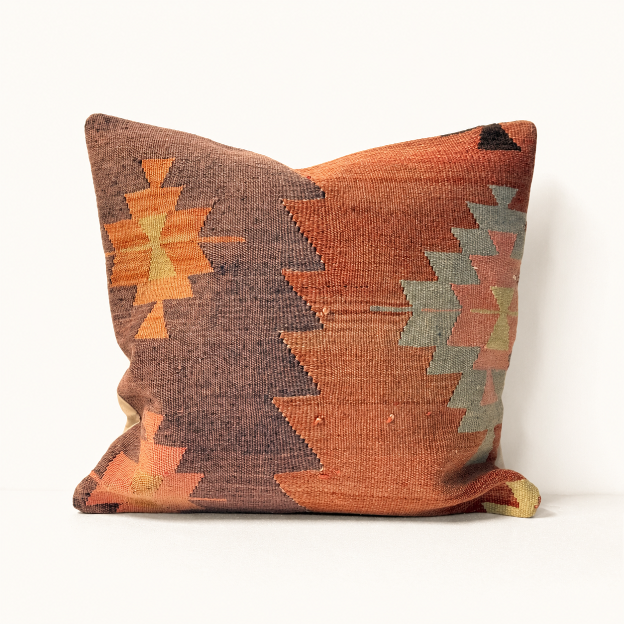 Terra Mosaic vintage kilim pillow cover with terracotta, gray, charcoal, and cream geometric kilim pattern, 20 x 20.
