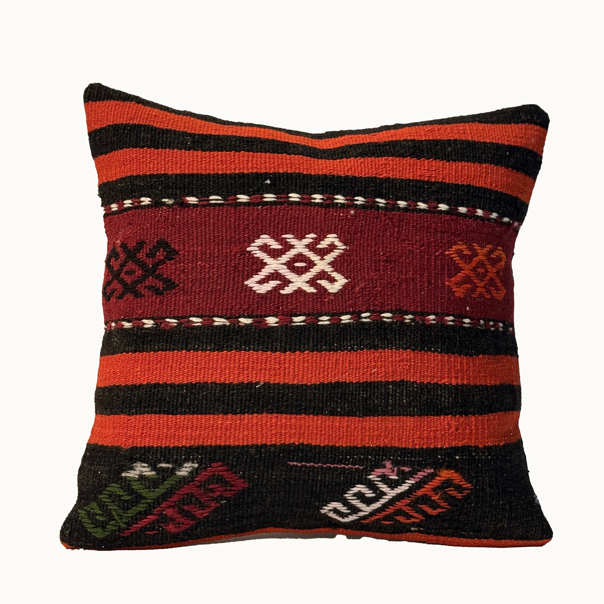Ember Medallion vintage kilim pillow cover with red, black, green, and cream medallion stripe motif, 16 x 16.
