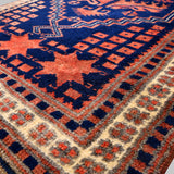 Odamish hand-knotted vintage mini wool rug (2’ x 3'8”)