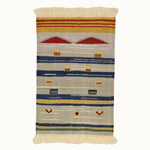 Red Peaks kids rug made from natural wool, perfect for nursery, playroom, and children's room decor.