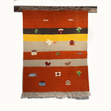 Toffee Parade kids rug made from natural wool, perfect for nursery, playroom, and children's room decor.

