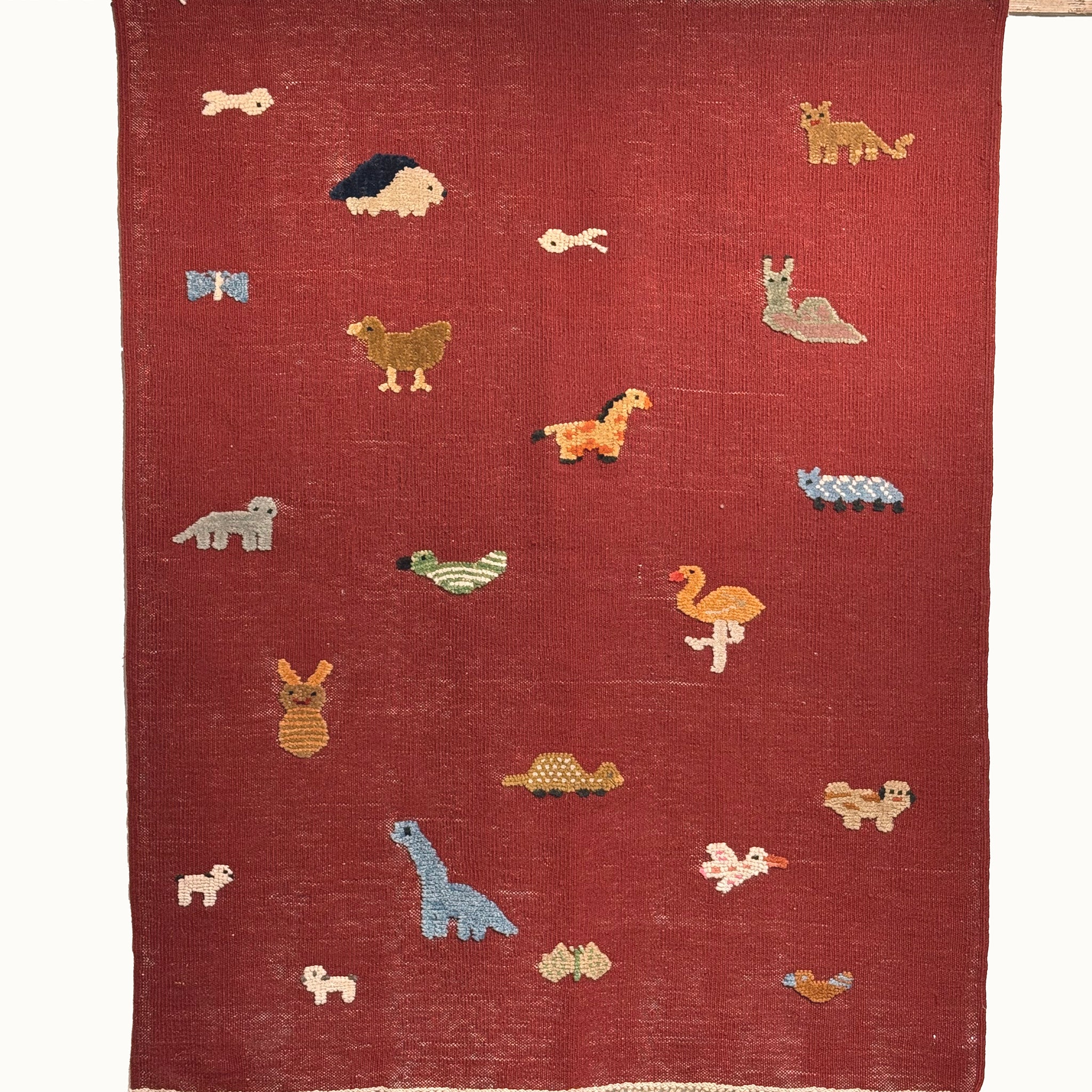 Storybook Safari kids rug made from natural wool, perfect for nursery, playroom, and children's room decor.
