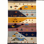 Patchwork Valley kids rug made from natural wool, perfect for nursery, playroom, and children's room decor.
