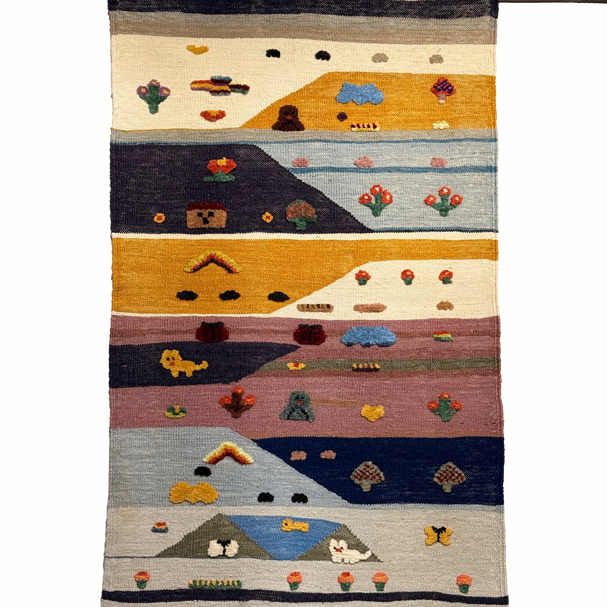 Patchwork Valley kids rug made from natural wool, perfect for nursery, playroom, and children's room decor.
