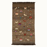 Village Bloom kids rug made from natural wool, perfect for nursery, playroom, and children's room decor.