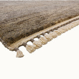 Natural hand-knotted wool rug (5'3” x 6'11")